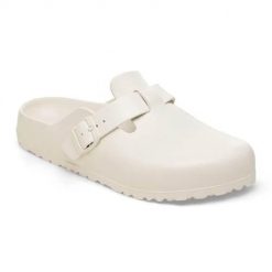 Klapki damskie Birkenstock Boston Eva Eggshell. Białe klapki Birkenstock, bez wzorów, z materiału, bez obcasa, bez zapięcia. Za 389.00 zł.
