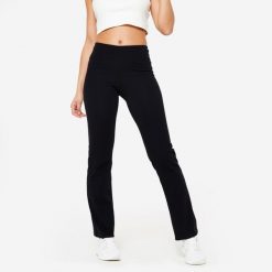 Legginsy fitness damskie Domyos rozkloszowane. Czarne legginsy DOMYOS, bez wzorów, z bawełny, sportowe. Za 69.99 zł.
