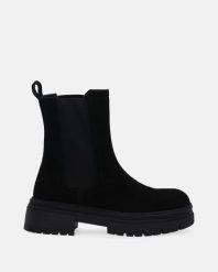 CZARNE SZTYBLETY Z ZAMSZU TW23W8850503 BLA. Czarne botki Venezia, bez wzorów, ze skóry, bez obcasa, bez zapięcia. Za 239.00 zł.