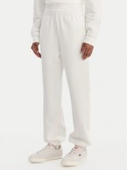 Lacoste Spodnie dresowe XF5244 Écru Regular Fit. Spodnie dresowe Lacoste, bez wzorów, z dresówki. Za 639.99 zł.