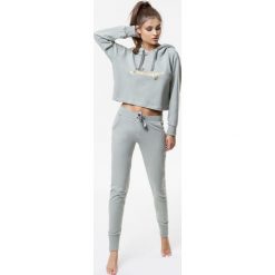 Cardio Bunny - Bluza Lipgloss. Zielone bluzy Cardio Bunny, s, bez wzorów, z bawełny, bez ramiączek, z kapturem. W wyprzedaży za 139.90 zł.