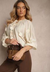 Beżowa Wiskozowa Koszula Zdobiona Wiązaniem i Aplikacjami z Kwiatami Belinea. Brązowe koszule Renee, z aplikacjami, z jeansu, eleganckie, bez kołnierzyka, bez ramiączek. W wyprzedaży za 67.99 zł.