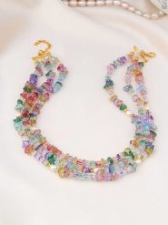 Pierres de Jade Pozłacany naszyjnik z elementami ozdobnymi - dł. 40 cm rozmiar: onesize. Białe naszyjniki Pierres de Jade, z materiału, z kryształem, pozłacane. Za 113.99 zł.