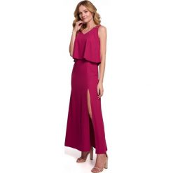 Długa zmysłowa sukienka z falbaną i rozcięciem niebieska. Niebieskie sukienki Sukienki.shop, na imprezę, m, bez wzorów, eleganckie, bez kołnierzyka, bez ramiączek, maxi. Za 349.00 zł.