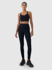 4F Legginsy treningowe bezszwowe damskie - czarne XS/S. Czarne legginsy 4f, bez wzorów, z dzianiny, klasyczne. W wyprzedaży za 99.99 zł.