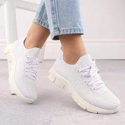 Półbuty sportowe damskie ażurowe slip on beżowe Artiker 56C1016. Brązowe buty sportowe lifestyle Artiker, w ażurowe wzory, z tkaniny, sportowe, bez zapięcia. Za 89.99 zł.