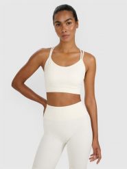 4F Biustonosz treningowy z niskim wsparciem - beżowy M/L. Brązowe biustonosze sportowe 4f, bez wzorów, z elastanu, na fitness i siłownię. Za 119.99 zł.