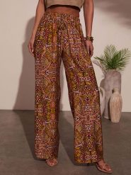 Milan Kiss Spodnie w kolorze jasnobrązowym rozmiar: XL. Brązowe spodnie materiałowe Milan Kiss, bez wzorów, z materiału. Za 126.99 zł.