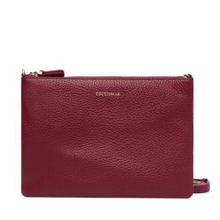 Torebka Coccinelle. Czerwone listonoszki Coccinelle, bez wzorów, bez dodatków. Za 439.99 zł.