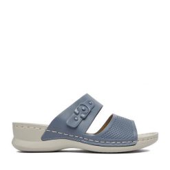 Klapki Clara Barson. Niebieskie klapki Clara Barson, bez wzorów, bez obcasa, bez zapięcia. Za 119.99 zł.