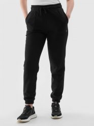 4F Spodnie dresowe joggery damskie - czarne XXL. Czarne spodnie dresowe 4f, bez wzorów, z bawełny, sportowe. Za 129.99 zł.