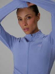 4F Bluza do jogi slim szybkoschnąca damska - niebieska XS. Niebieskie bluzy bez kaptura 4f, l, bez wzorów, z włókna, bez kaptura, na fitness i siłownię. Za 199.99 zł.