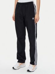 Adidas Spodnie dresowe Woven JD5335 Czarny Loose Fit. Czarne spodnie dresowe adidas, bez wzorów, z dresówki. Za 249.99 zł.