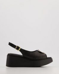 SANDAŁY NA KOTURNIE 60866 BLACK. Czarne sandały Venezia, bez wzorów, ze skóry, bez obcasa, na koturnie, bez zapięcia. Za 289.00 zł.