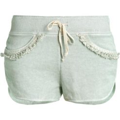 Isla Ibiza Bonita Spodnie treningowe mint. Niebieskie spodnie dresowe marki comma casual identity, z materiału, casualowe. W wyprzedaży za 209.30 zł.