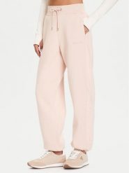 Guess Spodnie dresowe V5BB10 KB681 Różowy Regular Fit. Czerwone spodnie dresowe Guess, z aplikacjami, z bawełny. Za 299.99 zł.