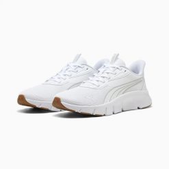 Buty sportowe unisex Puma FLEXFOCUS LITE MODERN białe 31009341 r 42.5. Białe buty treningowe Puma, bez wzorów, z materiału, bez zapięcia, na fitness i siłownię. Za 187.83 zł.