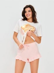 Bawełniana piżama dwuczęściowa z falbanką - kremowy. Białe piżamy Sinsay, l, bez wzorów, z bawełny, bez kołnierzyka, bez ramiączek. Za 39.99 zł.