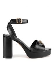 Nine West Sandały R25SS04320 Czarny. Czarne sandały Nine West, bez wzorów, z materiału, bez obcasa, na słupku, bez zapięcia. Za 199.99 zł.