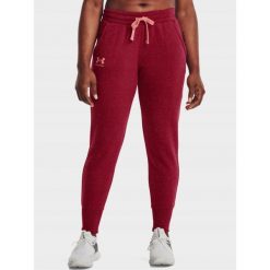 Spodnie dresowe damskie Under Armour. Czerwone spodnie dresowe Under Armour, bez wzorów, z dresówki, na fitness i siłownię. Za 166.99 zł.