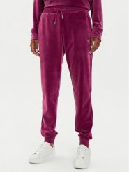 Guess Spodnie dresowe V3BB27 KBXI2 Różowy Regular Fit. Czerwone spodnie dresowe Guess, z aplikacjami, z dresówki. Za 359.99 zł.
