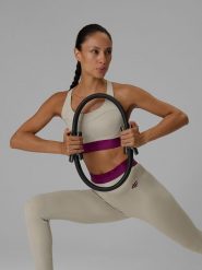 4F Biustonosz treningowy ze średnim wsparciem damski - beżowy L. Brązowe biustonosze sportowe 4f, bez wzorów, z gumy, na fitness i siłownię. Za 149.99 zł.