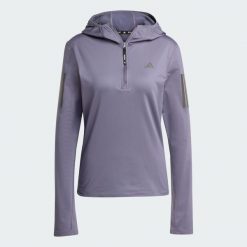 Bluza Own The Run Winterized Hooded Half-Zip. Fioletowe bluzy z kapturem adidas, xs, bez wzorów, z kapturem, do biegania, climawarm (adidas). W wyprzedaży za 244.45 zł.