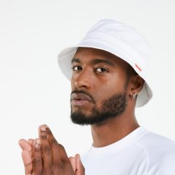 Kapelusz żeglarski Decathlon Sailing 100. Białe kapelusze TRIBORD, bez wzorów, z bawełny, sportowe. Za 49.99 zł.