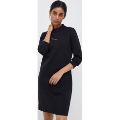 Calvin Klein sukienka kolor czarny mini prosta. Czarne sukienki Calvin Klein, na co dzień, l, bez wzorów, z włókna, bez kołnierzyka, bez ramiączek, mini, proste. Za 539.99 zł.