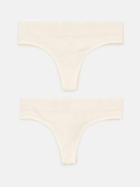 Prążkowane stringi 2 pack - biały. Białe stringi Sinsay, bez wzorów, prążkowane. Za 15.99 zł.