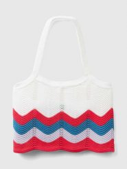 Benetton Top w kolorze białym ze wzorem rozmiar: 160. Białe topy Benetton, bez wzorów, ze splotem, bez kołnierzyka, bez ramiączek. Za 43.99 zł.