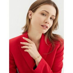 Bransoletka Guess. Żółte bransoletki Guess, złote. Za 219.99 zł.