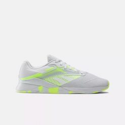 Sneakersy damskie Reebok Nano X4 buty sportowe treningowe tenisówki białe/żółte. Białe buty trekkingowe Reebok, bez wzorów, bez zapięcia, tenisowe. Za 449.00 zł.