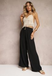 Czarne Spodnie w Stylu Alladynek High Waist Wykończone Gumką w Pasie Riselma. Czarne jeansy Renee, bez wzorów, z jeansu, sportowe, z podwyższonym stanem. W wyprzedaży za 29.99 zł.