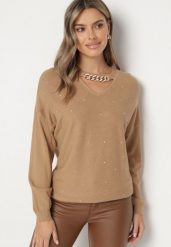 Ciemnobeżowy Sweter z Wiskozą Wycięciem Łańcuszkiem i Cyrkoniami Riaelani. Brązowe swetry Born2be, uniwersalny, z aplikacjami, z jeansu, eleganckie, bez ramiączek. W wyprzedaży za 67.99 zł.