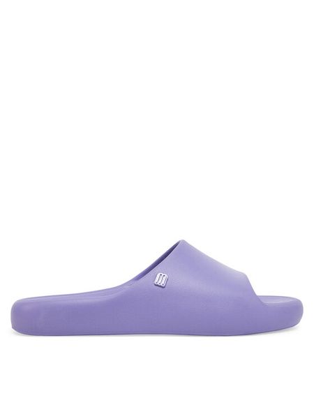 Melissa Klapki Melissa Free Print Slide Ad 33973 Fioletowy. Fioletowe klapki Melissa, bez wzorów, z tworzywa sztucznego, bez obcasa, bez zapięcia. Za 299.99 zł.
