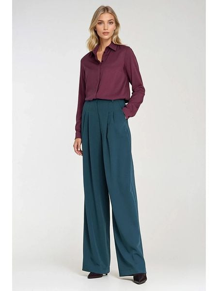 Nife Spodnie w kolorze niebieskim rozmiar: 42. Niebieskie spodnie materiałowe Nife, bez wzorów, z materiału, z podwyższonym stanem. Za 178.79 zł.