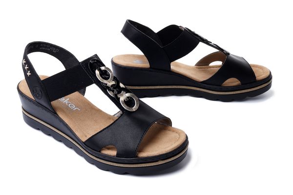 RIEKER 67498-00 black, sandały damskie. Czarne sandały Rieker, bez wzorów, bez obcasa, na koturnie, bez zapięcia. Za 319.90 zł.