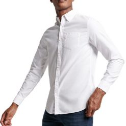 Koszula z długim rękawem z bawełny organicznej Superdry Oxford. Białe koszule Superdry, xl, bez wzorów, z bawełny, casualowe, bez kołnierzyka, bez ramiączek. Za 269.60 zł.