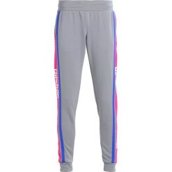 Reebok Classic Spodnie treningowe fligry. Spodnie sportowe marki Reebok Classic. W wyprzedaży za 148.85 zł.