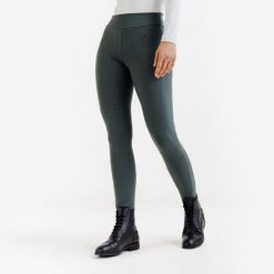 Legginsy jeździeckie damskie full grip - 500 zielone. Zielone legginsy FOUGANZA, bez wzorów, z lycry, długie. Za 169.99 zł.