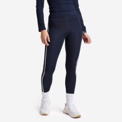 Legginsy fitness damskie Domyos. Niebieskie legginsy DOMYOS, bez wzorów, z elastanu, sportowe. Za 129.99 zł.