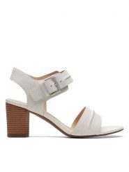 Clarks Skórzane sandały "KarseaHi Seam" w kolorze białym na obcasie rozmiar: 39,5. Białe sandały Clarks, bez wzorów, ze skóry, z otwartym noskiem, bez obcasa, na koturnie, bez zapięcia. Za 164.92 zł.