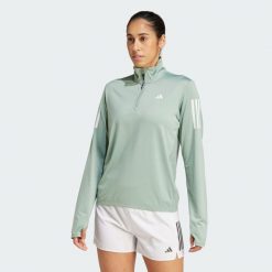 Kurtka Own the Run Half-Zip. Zielone kurtki do biegania adidas, m, bez wzorów, z materiału, bez kaptura, do biegania. Za 207.75 zł.