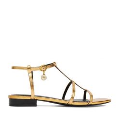 Sandały GINO ROSSI. Żółte sandały Gino Rossi, bez wzorów, bez obcasa, na płaskiej podeszwie, bez zapięcia. Za 299.99 zł.