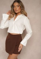 Biała Bawełniana Koszula w Stylu Bombki z Gumką w Talii Olithralis. Białe koszule Renee, m, bez wzorów, z bawełny, biznesowe, bez kołnierzyka, bez ramiączek. W wyprzedaży za 75.99 zł.