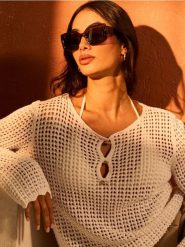 Ażurowy sweter z bawełny - kremowy. Białe swetry Sinsay, l, w ażurowe wzory, z bawełny, bez ramiączek. Za 49.99 zł.