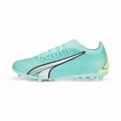 Buty sportowe dla dorosłych do gry w piłkę Ultra Match Mg. Zielone buty treningowe Puma, bez wzorów, z materiału, bez zapięcia. Za 257.30 zł.