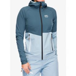 Kurtka softshell damska Ortovox Punta Berrino Hooded Jacket. Niebieskie kurtki przejściowe sportowe ORTOVOX, bez wzorów, z softshellu, bez kaptura, trekkingowe. Za 962.49 zł.