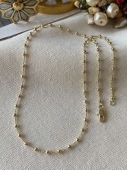 Luseera Pozłacany naszyjnik z elementami ozdobnymi - dł. 45 cm rozmiar: onesize. Żółte naszyjniki Luseera, z materiału, pozłacane. Za 43.99 zł.